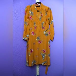 Orange floral dress.